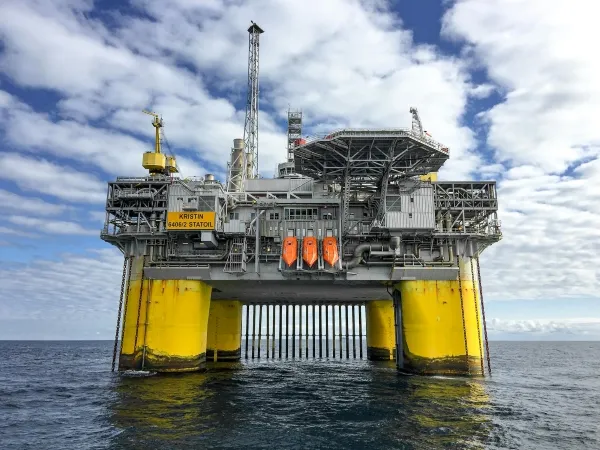 Corrosion and Fatigue Behavior of Inconel 718 in Aggressive Offshore Environments